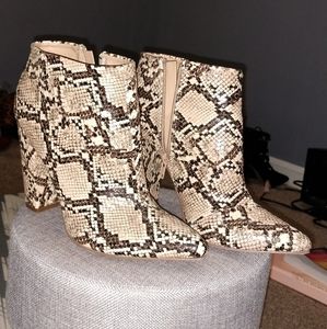 Snake print ankle bootie.